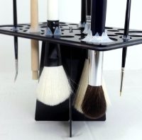 Silicone brush holders easily hold various brushes