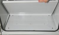 Bottom tray to insert dessicant materials