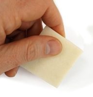 Adhesive removal eraser
